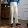 Men's high waist straight leg casual trousers in black polyester fabric on a hanger.