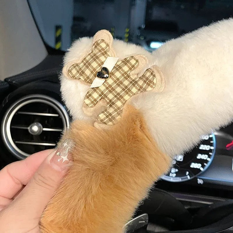 Milk tea white plush steering wheel cover with panda ears on a car steering wheel