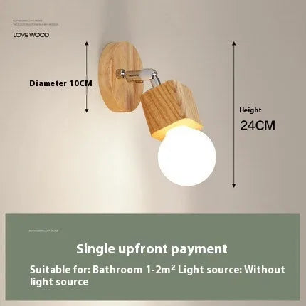 Single head mirror cabinet wall lamp with a 24cm diameter frame.