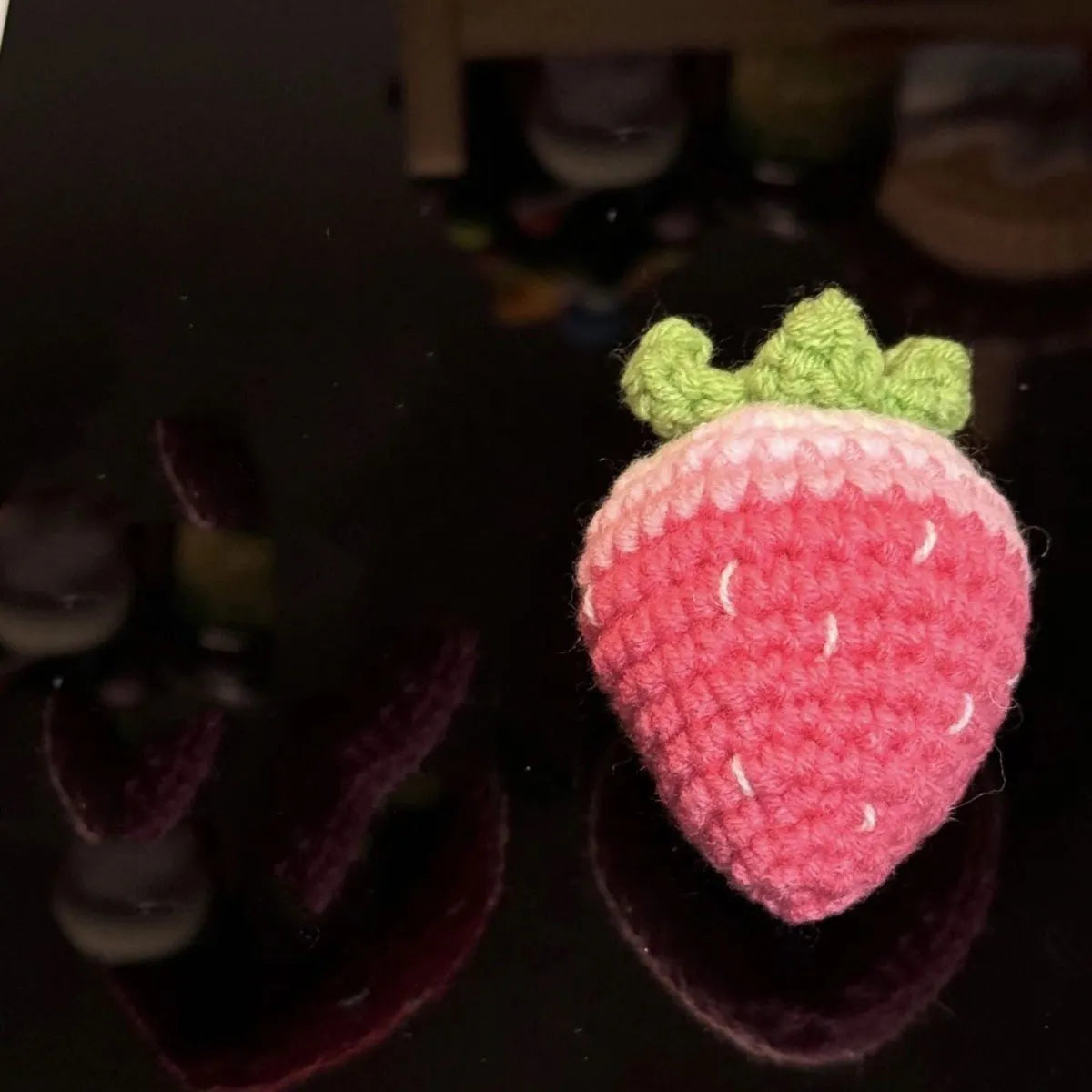 Soft plush strawberry pendant keychain in pink and red colour options with metal ring