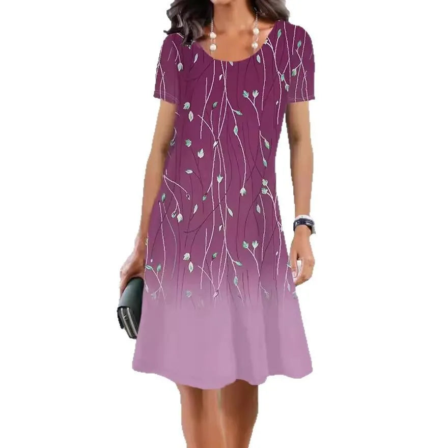 Women's floral print summer dress with short sleeves and an A-line midi skirt on a hanger.