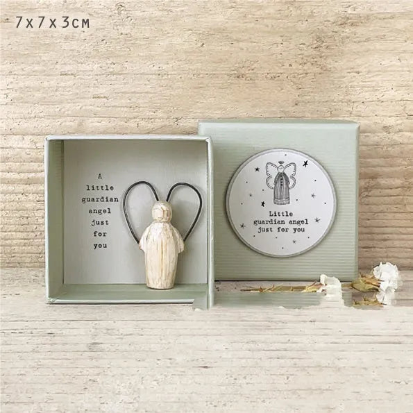 Boxed plastic resin guardian angel ornament in cartoon style for gifting