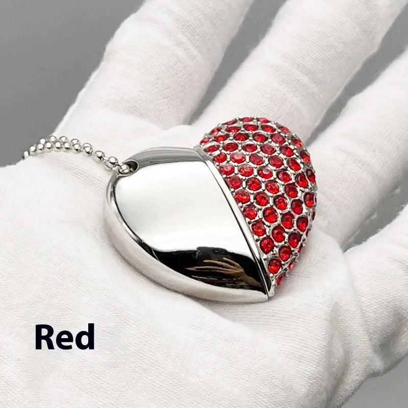 Blue heart-shaped USB flash drive with a textured brick-inlaid pattern on its metal shell.