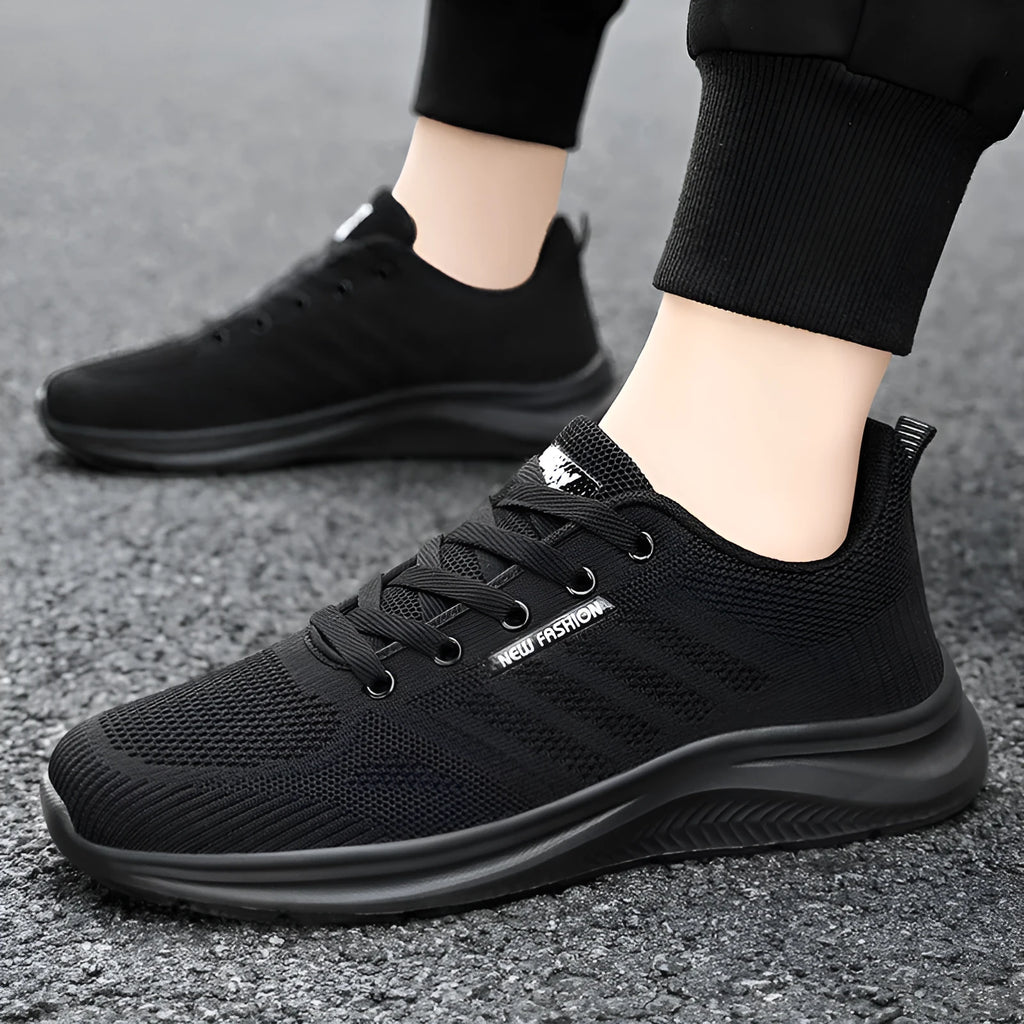 Unisex mesh upper casual trainers in solid colour, available in black, grey, and pink, sizes 36-44