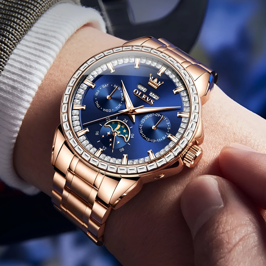 Men's diamond-embedded automatic watch with stainless steel bracelet and transparent case back.