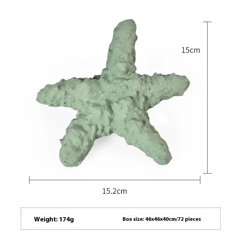 Blue and green shark-shaped rubber dog chew toy on a white background.