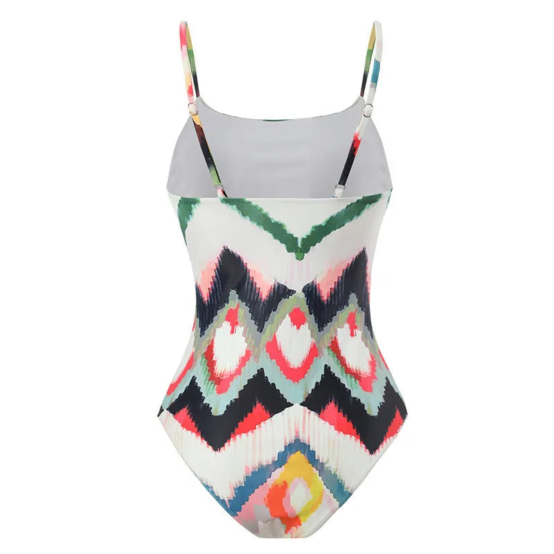 Women's two-piece swimsuit set with striped pattern and coordinating hip skirt on beach background