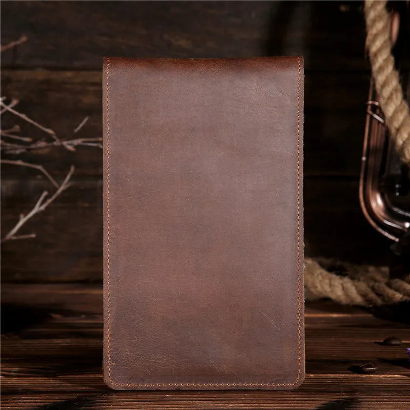 Slim brown cowhide men's wallet open to show 18 card slots and a phone compartment.