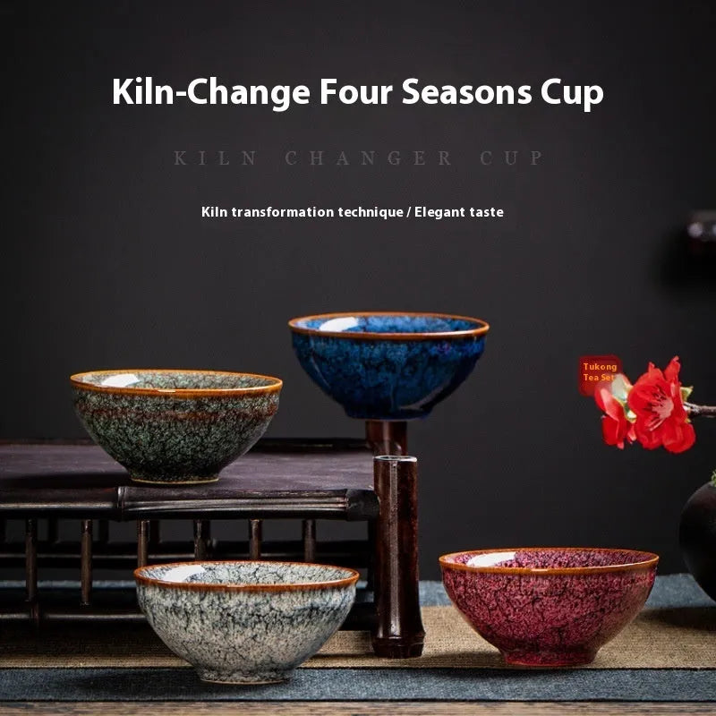 Ceramic Kung Fu tea cup set with four matching cups in light colour gift box