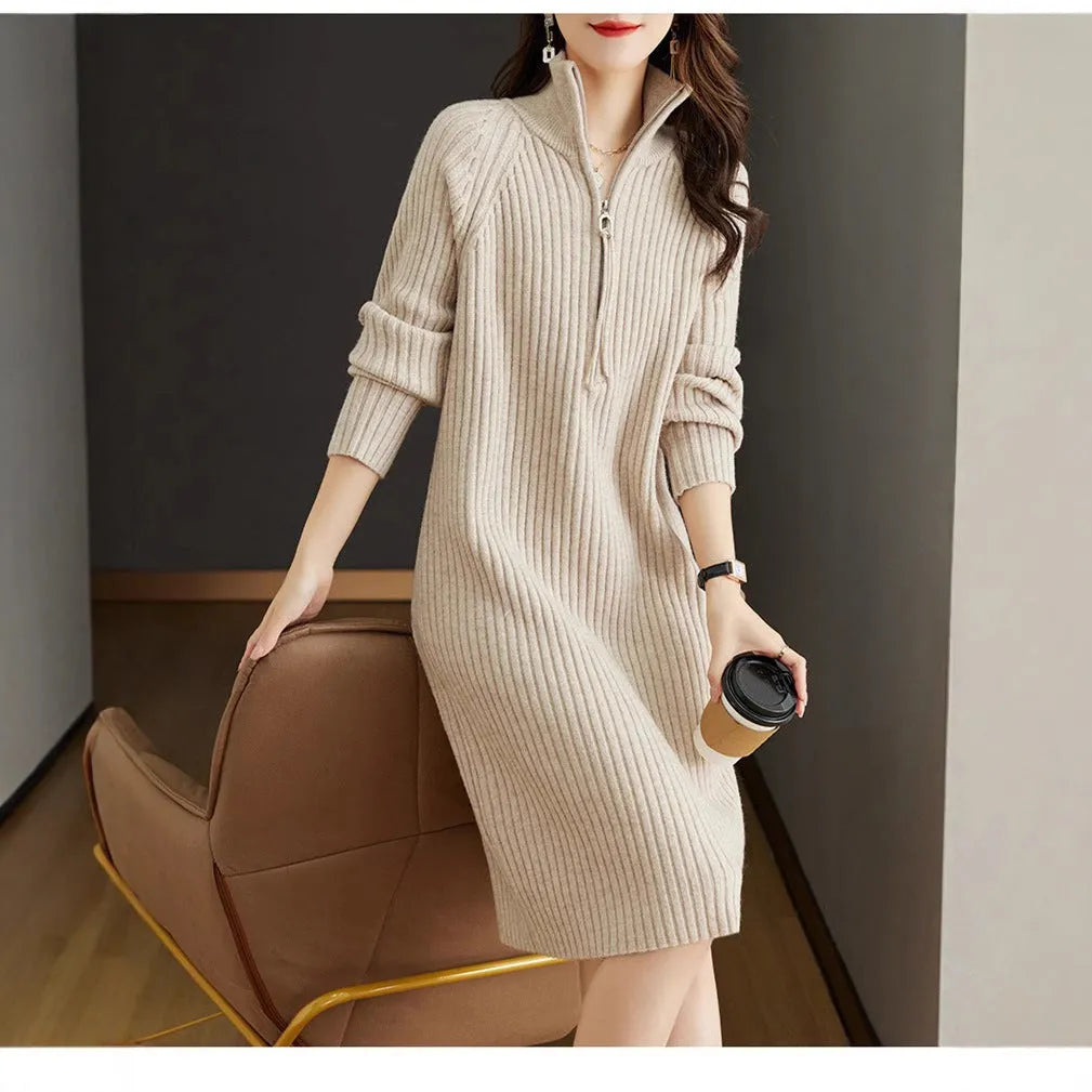 Beige half zip stand collar straight skirt with long sleeves on a mannequin