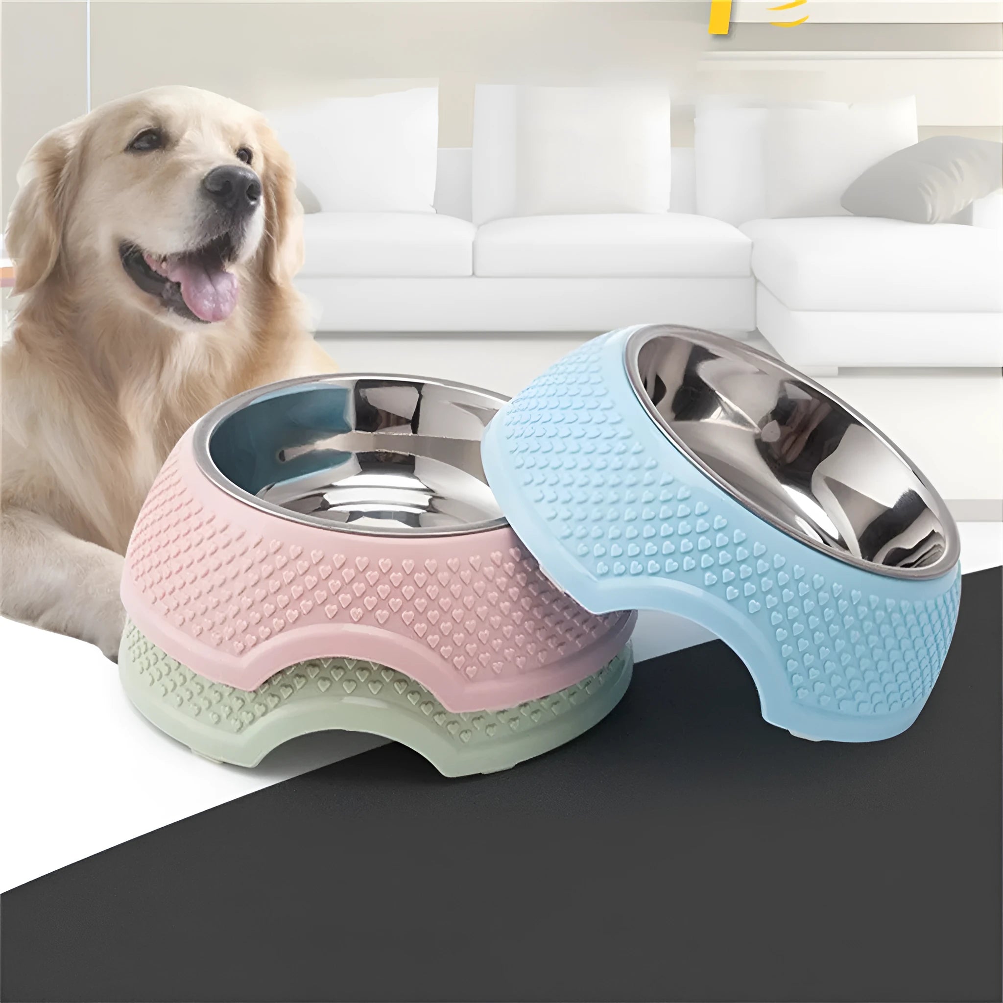 Blue stainless steel pet bowl with a non-slip base for cats and dogs on a floor.