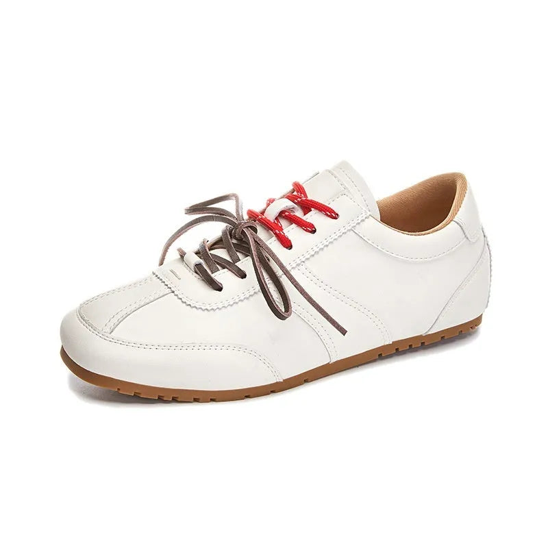 White women's lace-up casual sneakers with horse fur flocking texture, flat heel, and round toe.