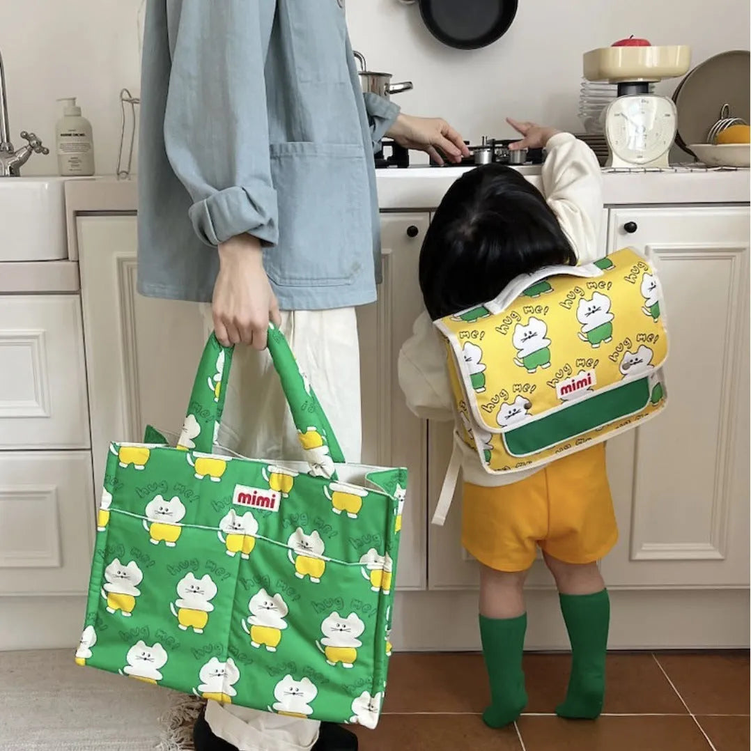 Pet storage outing cartoon printing cotton handbag with burden reduction in green kitten colour