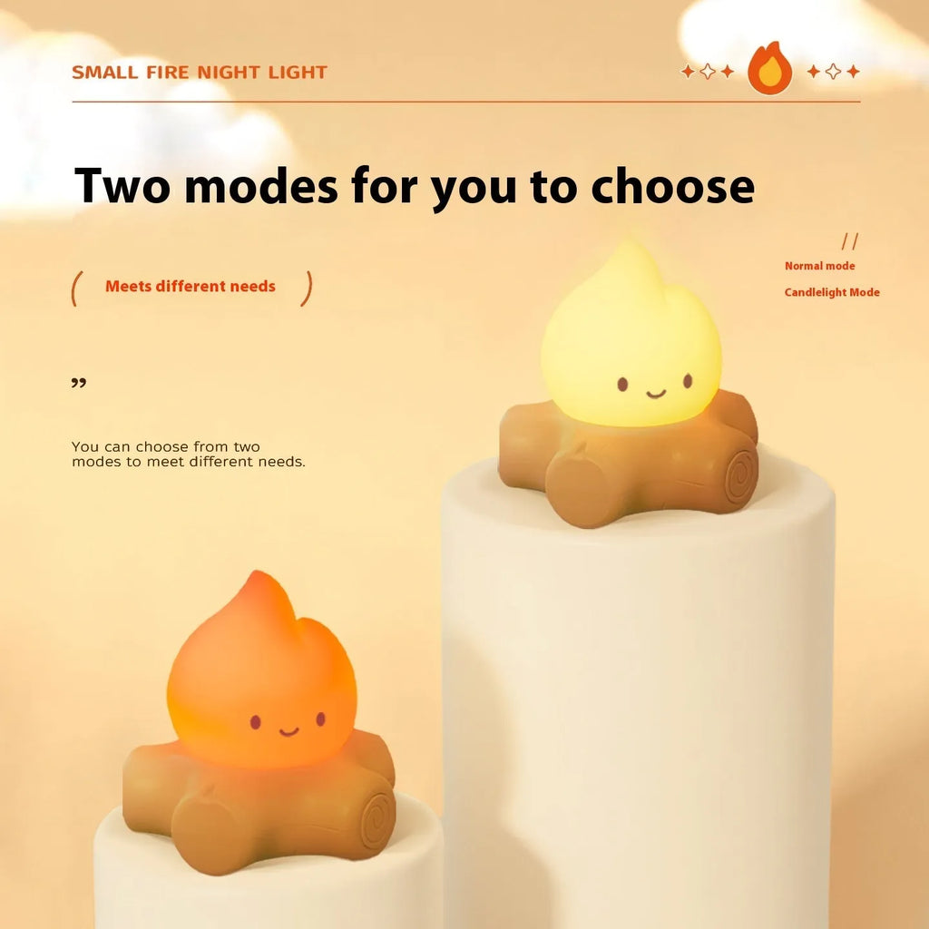 Small Fire Pile cartoon-style night lamp with yellow light on a surface.
