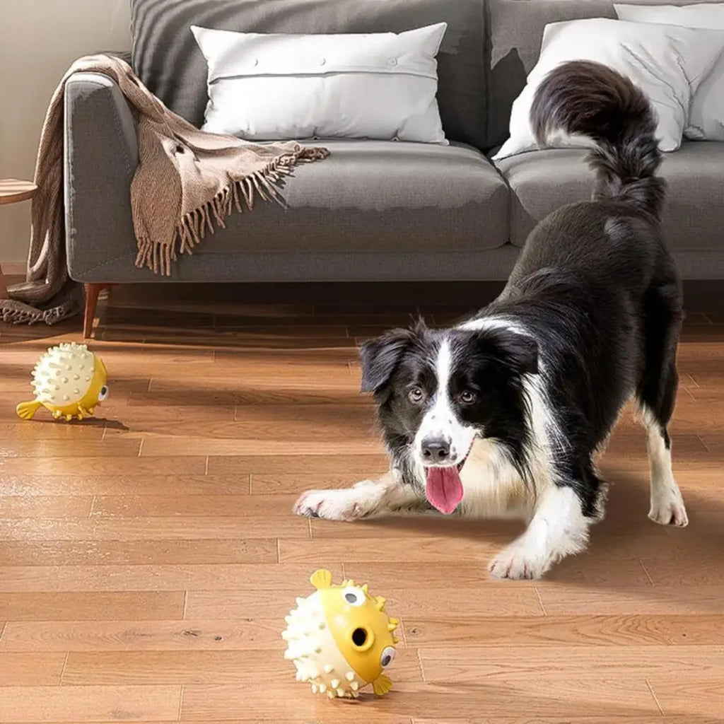 Yellow fish-shaped durable vinyl dog chew toy with textured surface for aggressive chewers.
