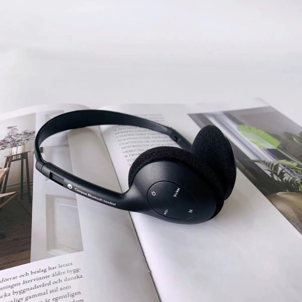 Retro wireless Bluetooth headset in black silver dotted line, lightweight over-ear design