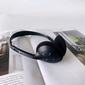 Retro wireless Bluetooth headset in black silver dotted line, lightweight over-ear design