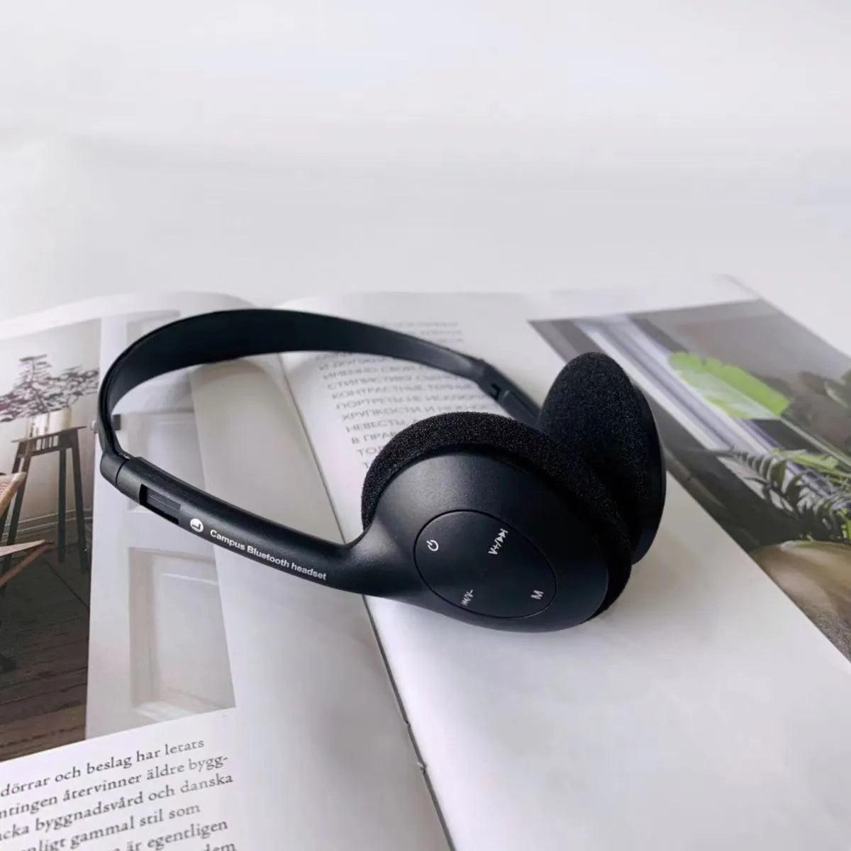 Retro wireless Bluetooth headset in black silver dotted line, lightweight over-ear design