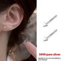 999 pure silver anti-blocking ear studs in butterfly shape on white background