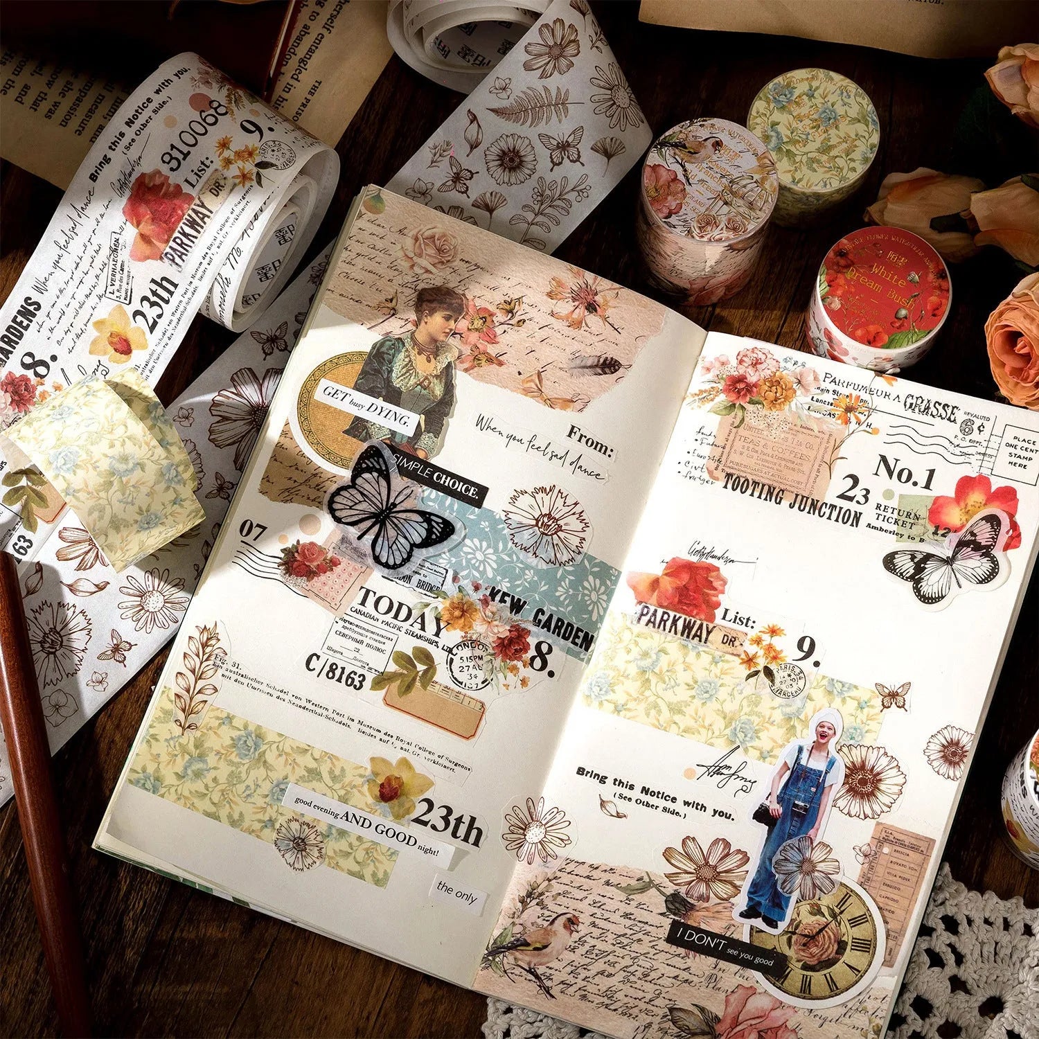 Roll of vintage floral watercolour washi tape on a Japanese paper base, showing patterns like Fog Mountain Forest.