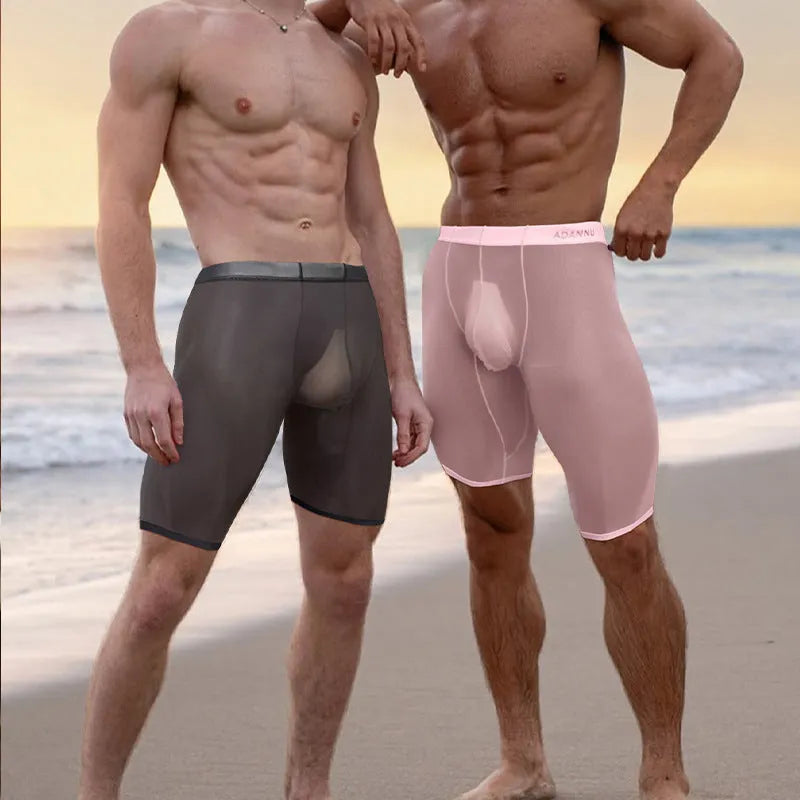 Men's solid colour mesh home shorts in knitted nylon fabric on a neutral background
