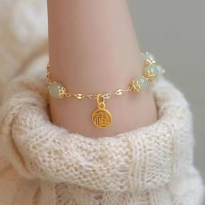 Chinese style glass bracelet with bamboo joint design elements in multiple colour options