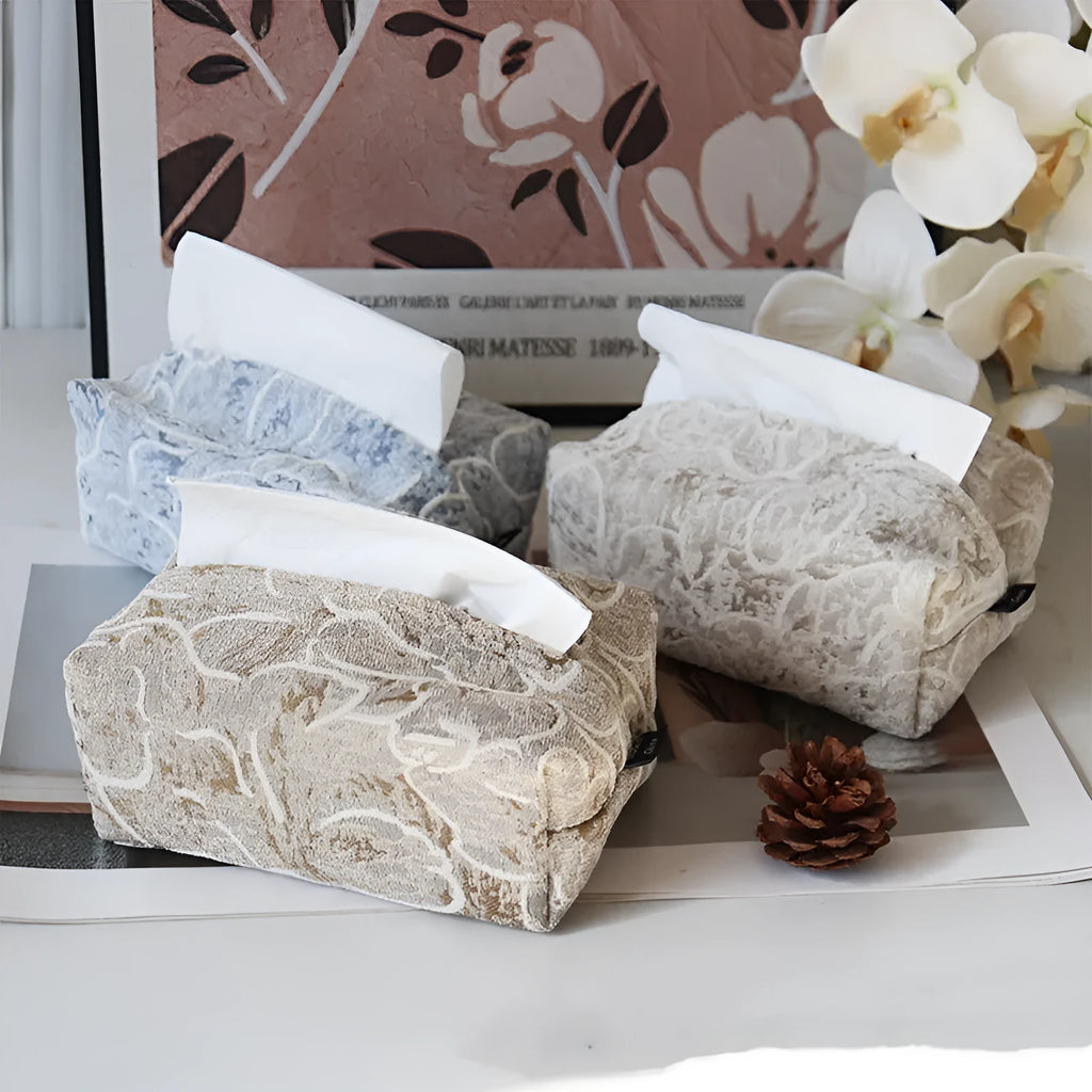 Cotton floral tissue box cover in beige, blue, and brown colour options on a table.