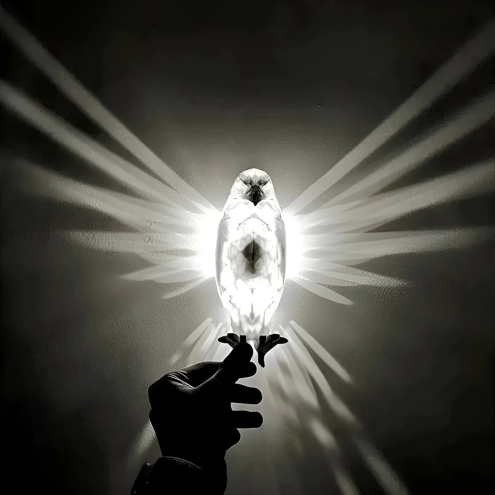 3D printed eagle silhouette wall lamp projecting animal shadows on wall