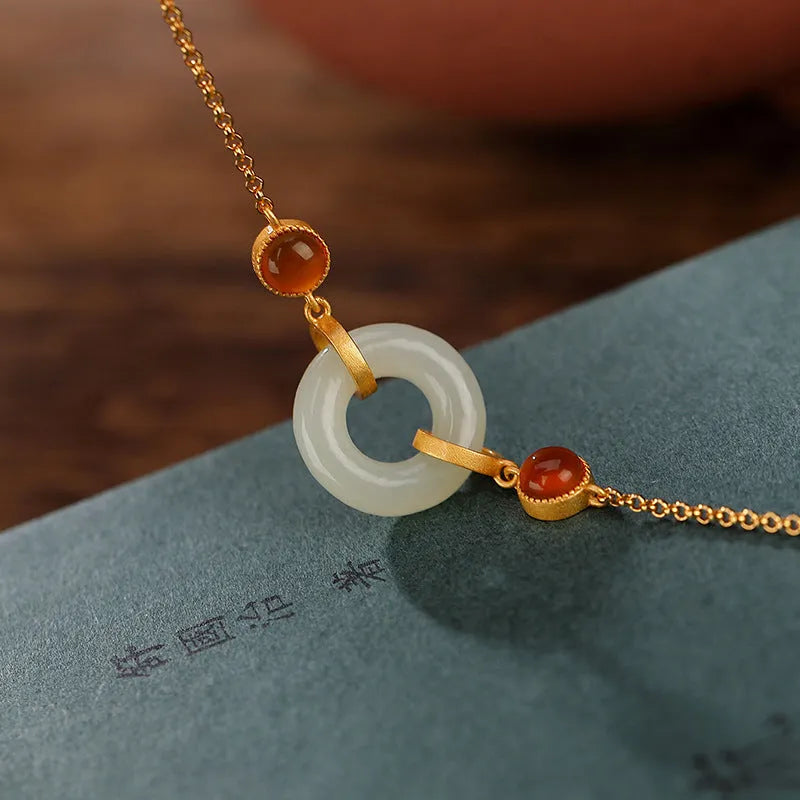 S925 sterling silver gold-plated bracelet with natural Hetian jade peace symbol buckle and adjustable clasp