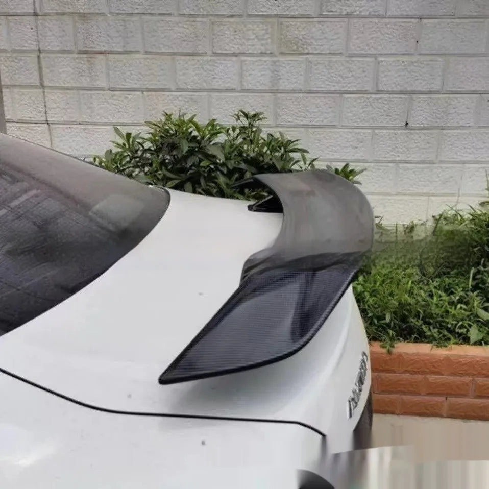 Universal punch-free fixed-air car spoiler tail wing made from black ABS plastic.