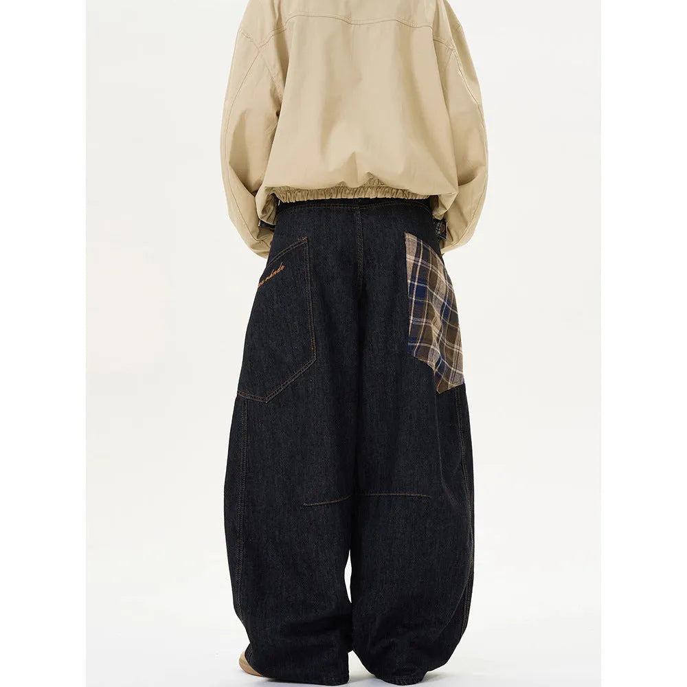 Cotton loose straight-leg trousers in plaid pattern showing mid waist and casual styling