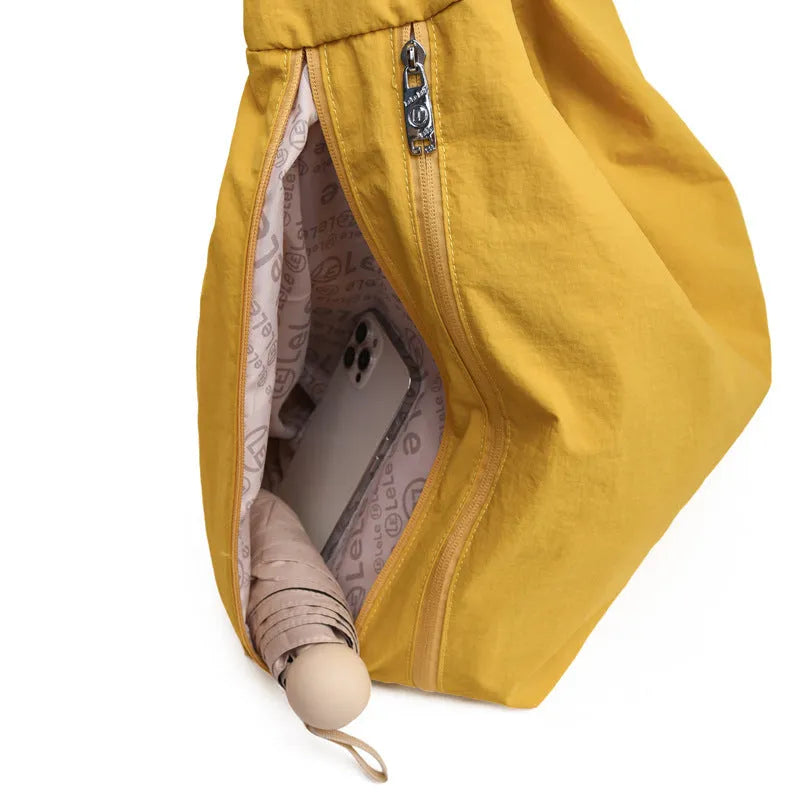 Heart-shaped nylon underarm bag for women in black, blue, khaki, or yellow colour options