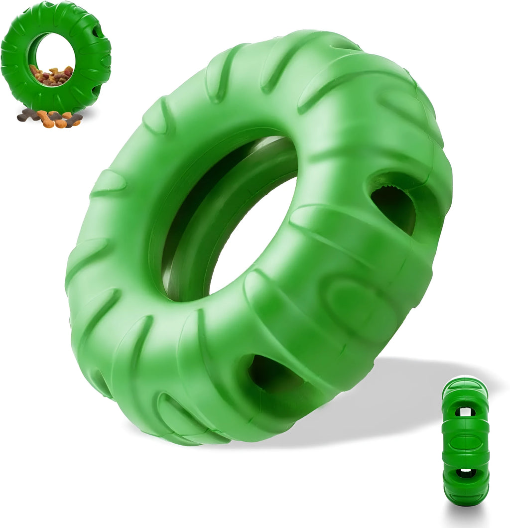 Blue rubber tyre-shaped dog chew toy with oval openings, shown next to dog treats.