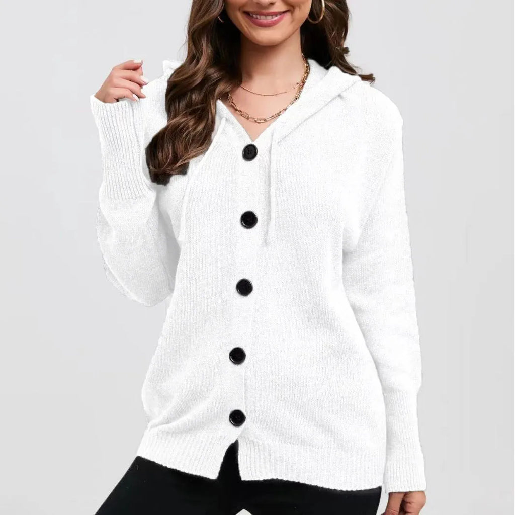 Women's solid colour hooded cardigan in thick cotton fabric showing loose fit and long sleeves