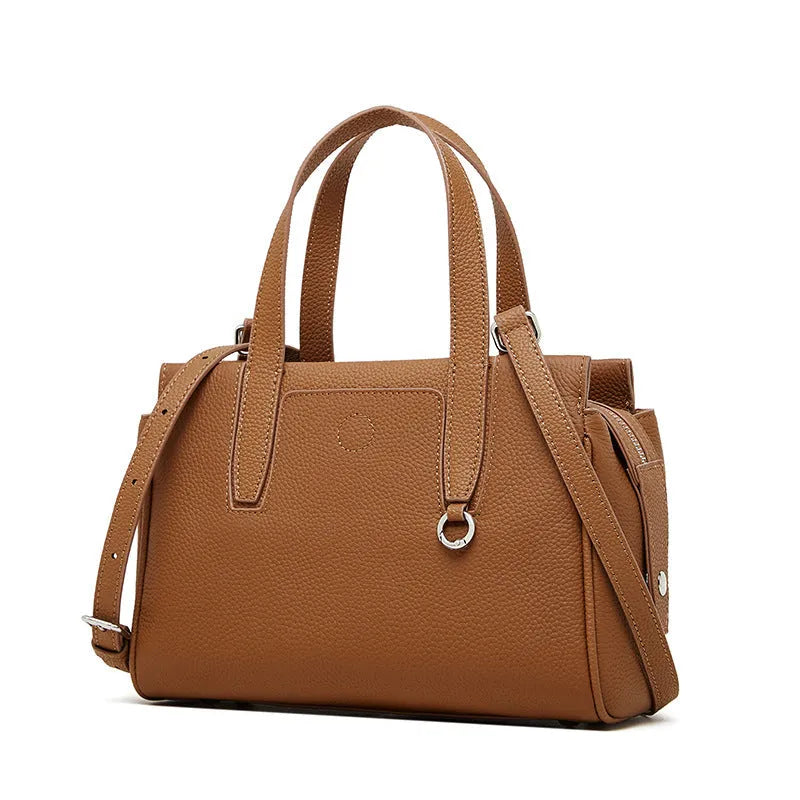 Genuine leather crossbody bag in horizontal square design with single strap, shown in black colour option.