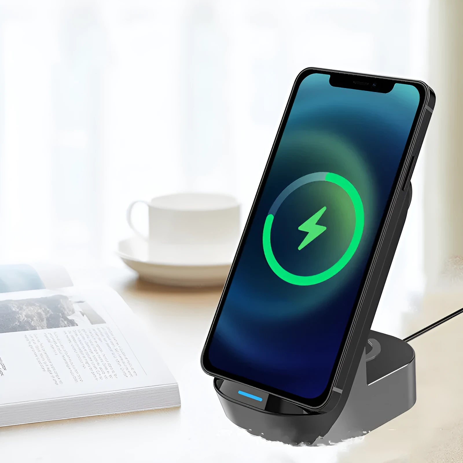 Black grey foldable 3-in-1 wireless charging stand with phone upright, watch and earbuds on pads.
