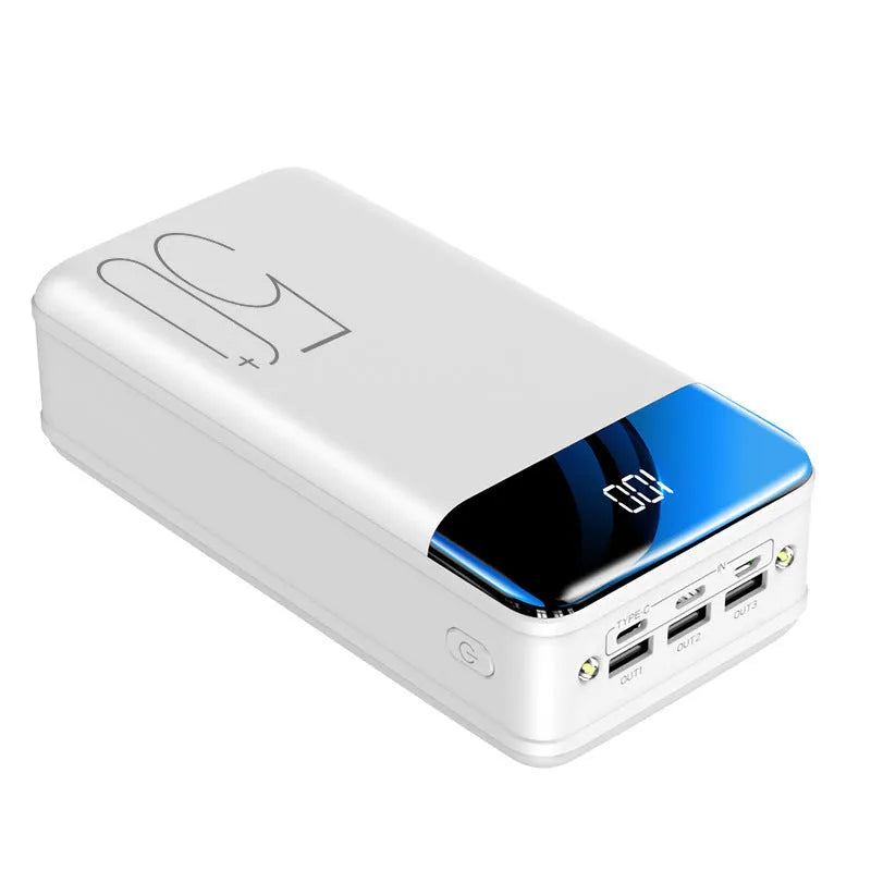 Black large capacity 50000mAh portable power bank with three USB output ports showing size scale.