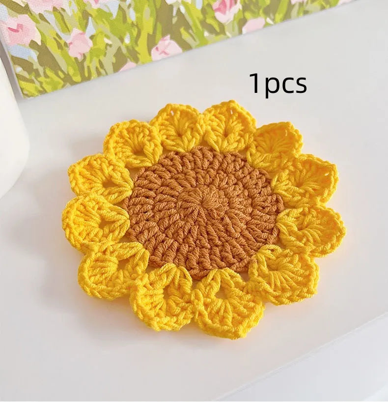 Hand-woven circular wool coaster with flower pattern, 10cm diameter