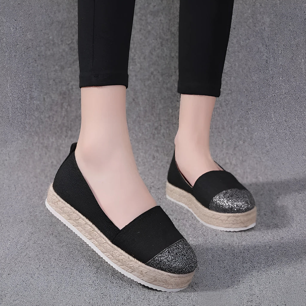 Plus size breathable canvas flat shoes in black with round toe and slip-on design