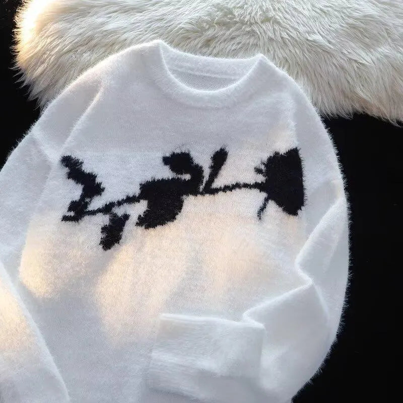 Men's dark rose and flocking horse graphic pullover sweater in a casual setting.