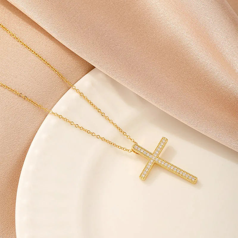 Women's copper necklace showing four pendant options: heart, round diamond, butterfly, and cross