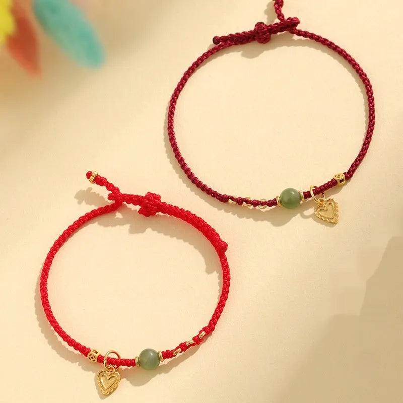 Handmade women's 925 silver and Hetian jade woven bracelet with red carrying strap