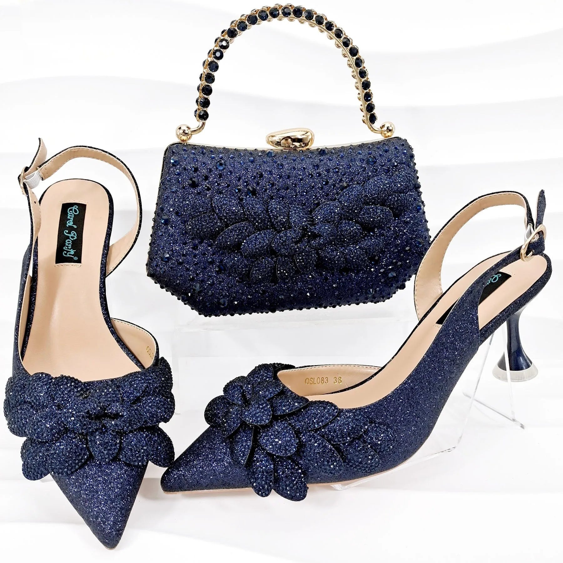 Party shoes and bag set with wine glass heel, rhinestone decoration, and buckle fastening in silver colour