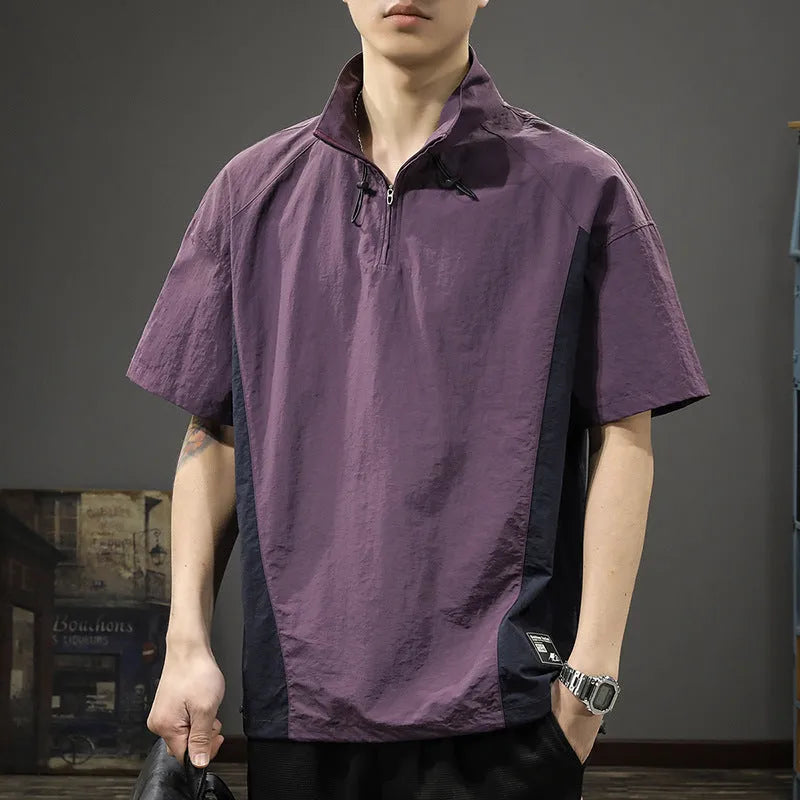 Brown men's short-sleeve half-zip shirt with a stand collar, showing the loose fit and ice silk fabric texture.