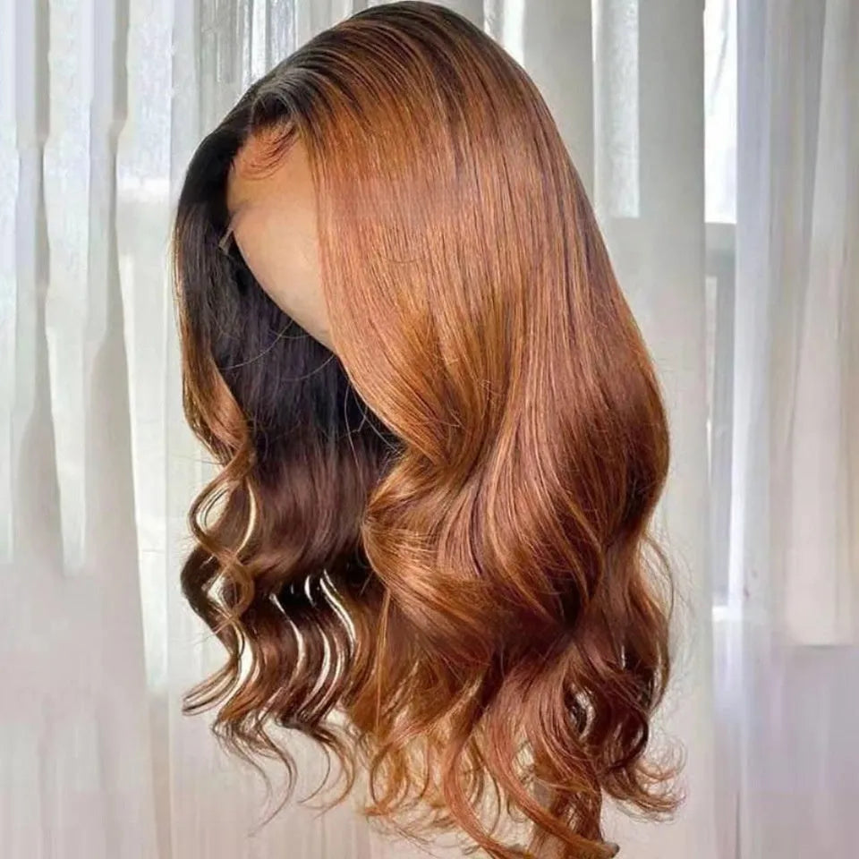 A woman wearing a long, gradient brown human hair lace front wig with a natural hairline.
