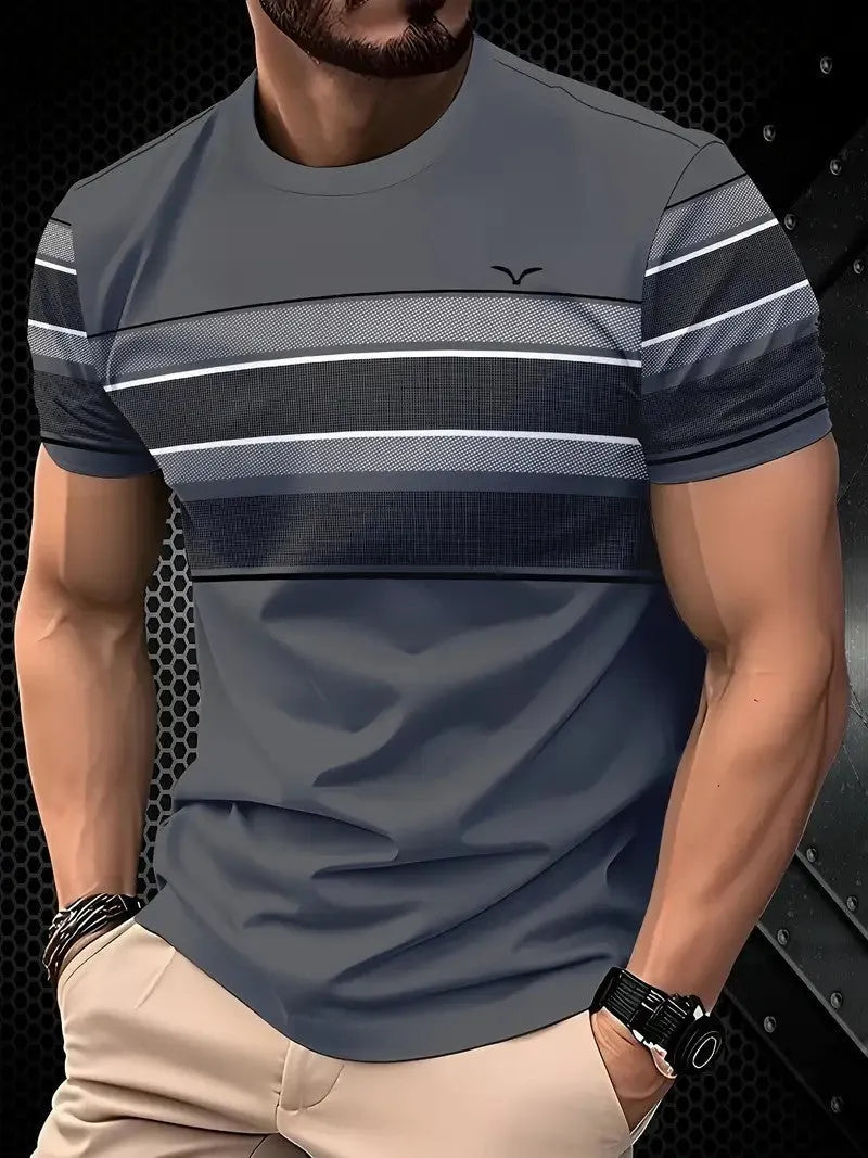 Man wearing a loose fit grey short sleeve polyester T-shirt on a casual summer day.