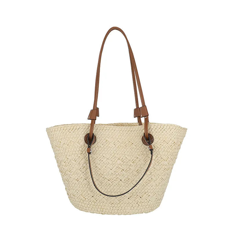 Beige woven shoulder bag with retro styling and dual-carry handles shown in horizontal square suitcase shape