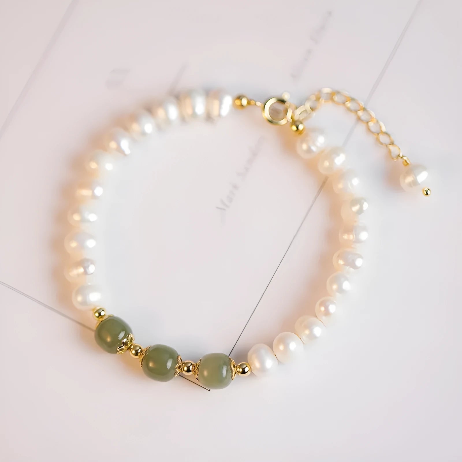 Korean style freshwater pearl bracelet in diamond shape, electroplated in Hetian jade colour.