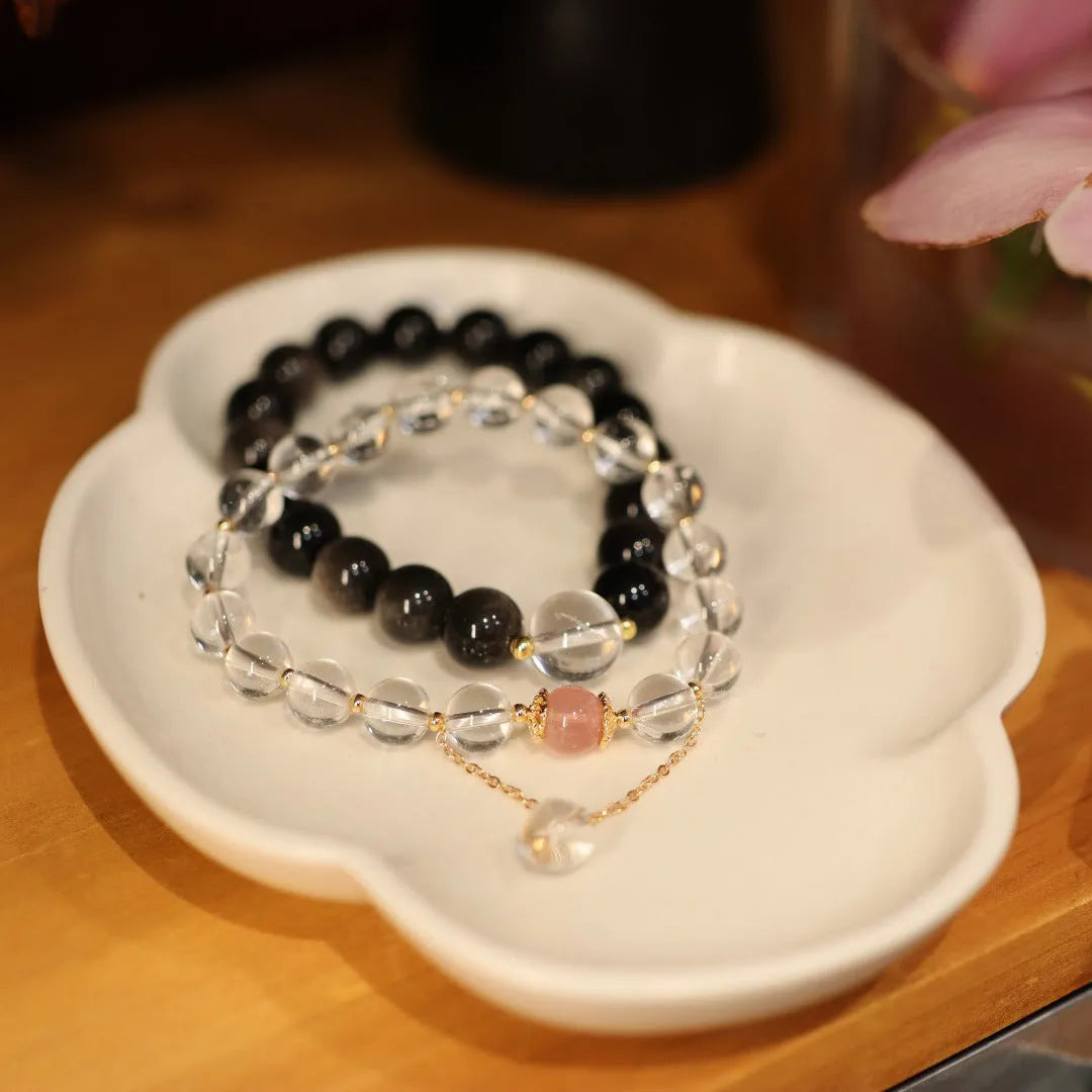Chinese style geometric crystal bracelet with white crystal and cat eye obsidian stones