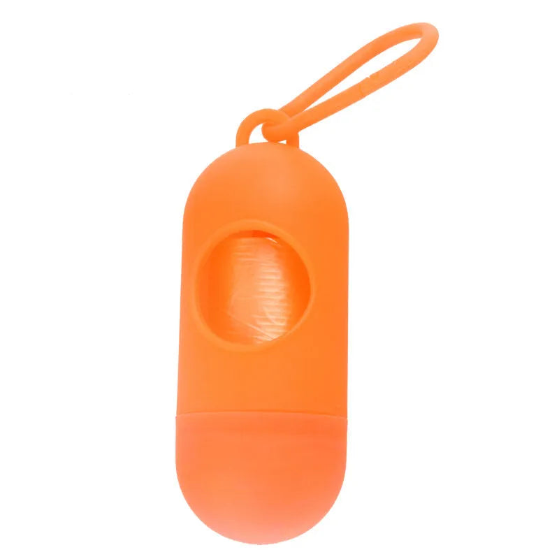 Black dog poop bag holder with side hook and Velcro closure, showing compact size.